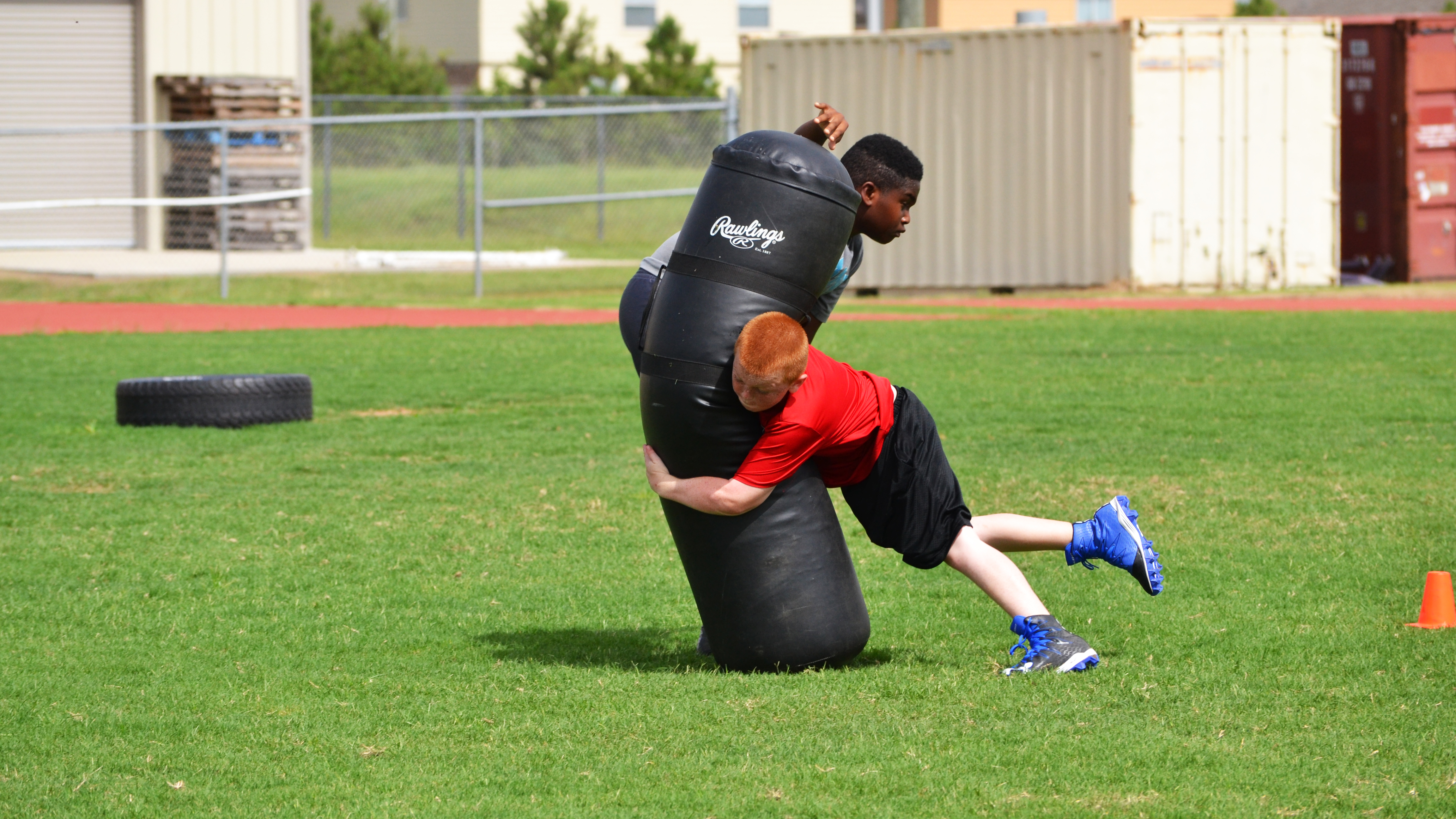boy plowing in to bag
